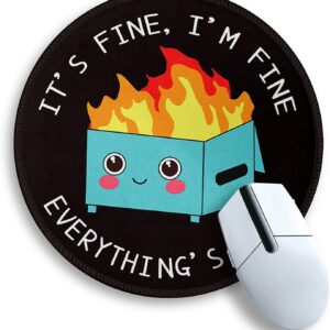 The image shows a cartoon dumpster on fire on a mouse pad. The dumpster is overflowing with trash and flames are shooting out of the top. The mouse pad is black with a stitched edge.