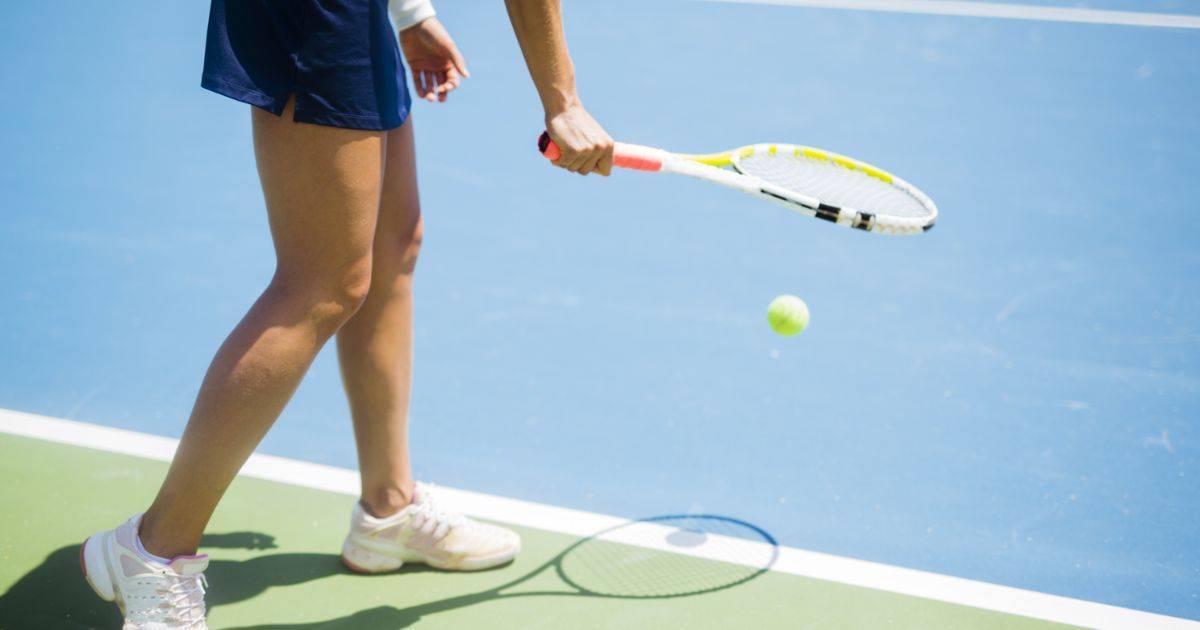 Tennis ball bouncing in a tennis court..