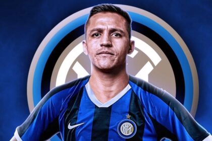 A soccer player in a blue uniform, ready to kick the ball on the field. Inter Expects Sanchez to Return